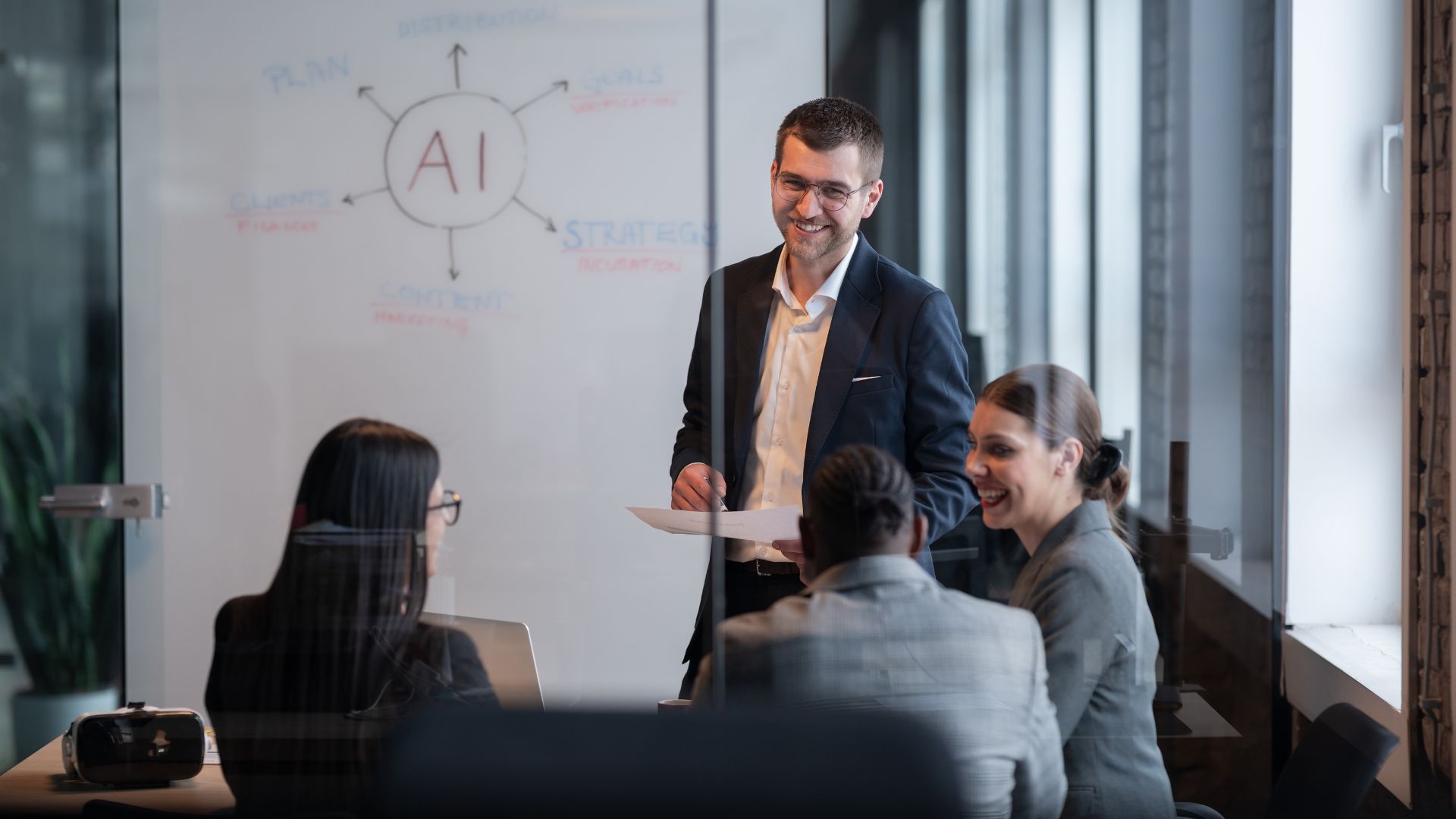 AI in sales leadership: a Sales Geek strategy session with a leadership team in a meeting room